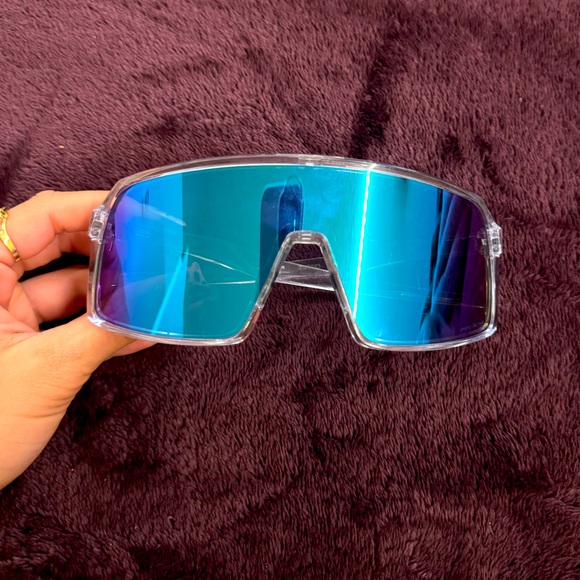 Blue and clear with gold accent Oakley sutros